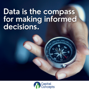 Image of hand holding a compass with text "Data is the compass for making informed decisions"